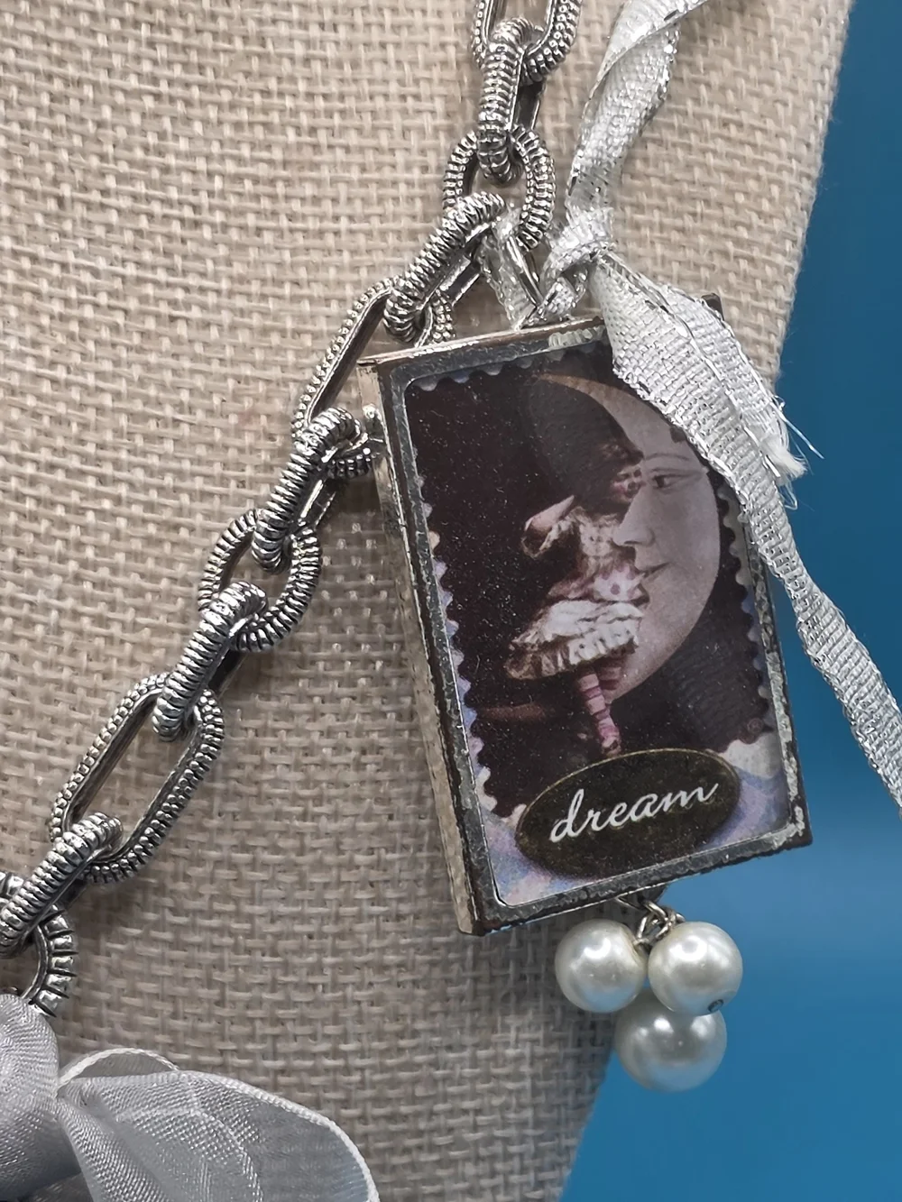 Silver-Tone Charm Necklace with Sheer Gray Bow and Pearl Drops